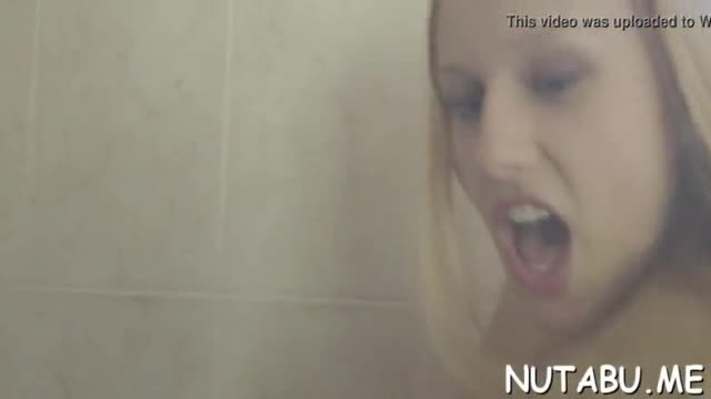 Raunchy lady is posing in front of the camera